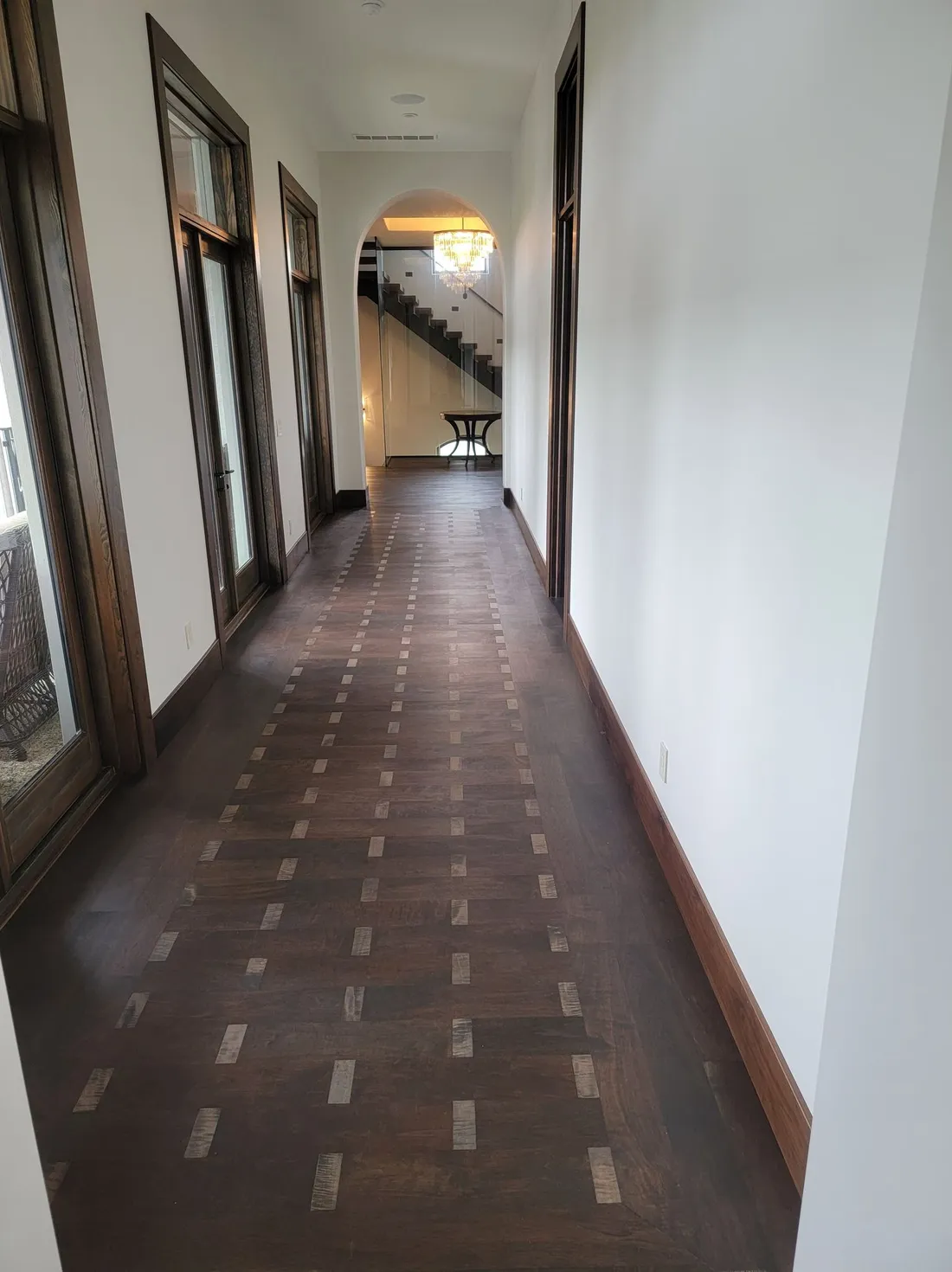 Long corridor with an inlaid hardwood border